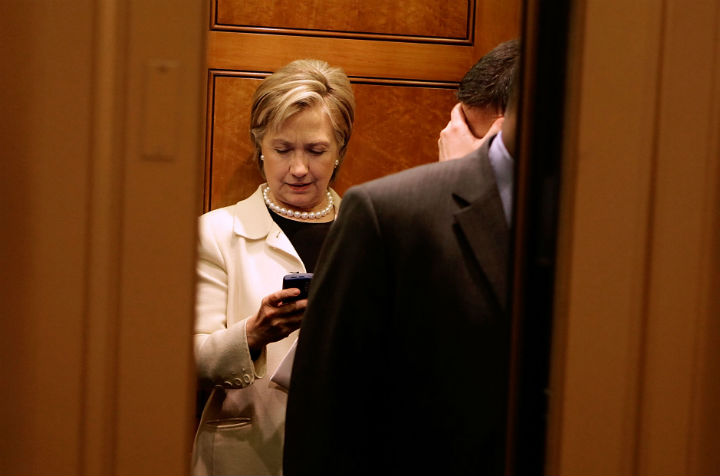  Secretary of State-designate and U.S. Senator Hillary Clinton (D-NY) looks at her BlackBerry while on an elevator at the U.S. Capitol January 7, 2009 in Washington, DC. (File photo) .