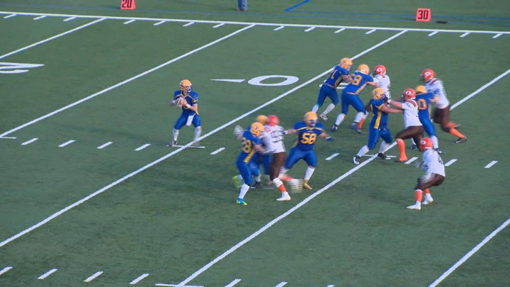 Saskatoon Hilltops quarterback Jared Andreychuk drops back to pass during the 2015 Canadian Bowl.