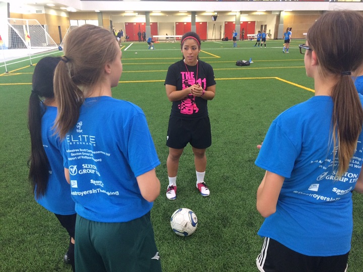  Scott instructs girls at her second annual soccer camp in 2015.