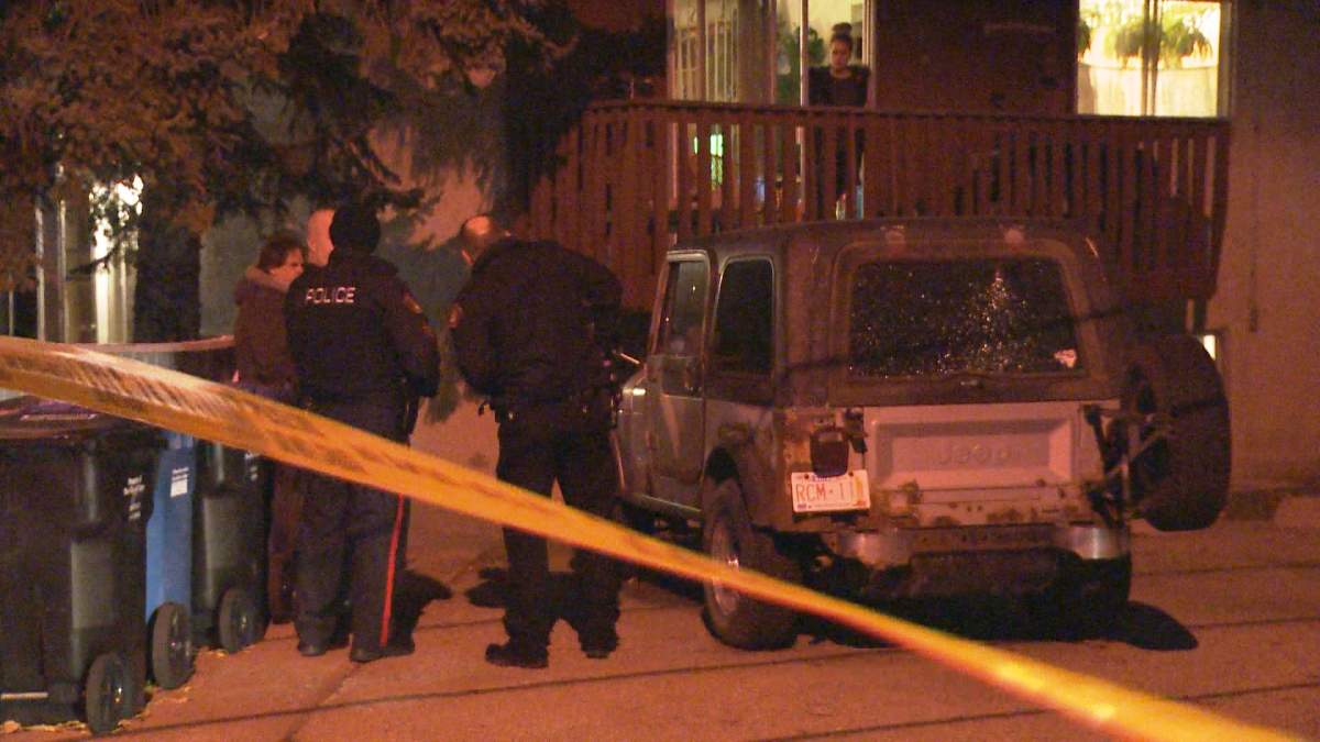 Police investigate after shots were fired in the 100 block of Tache Avenue N.W. on Sunday, Nov. 8, 2015.