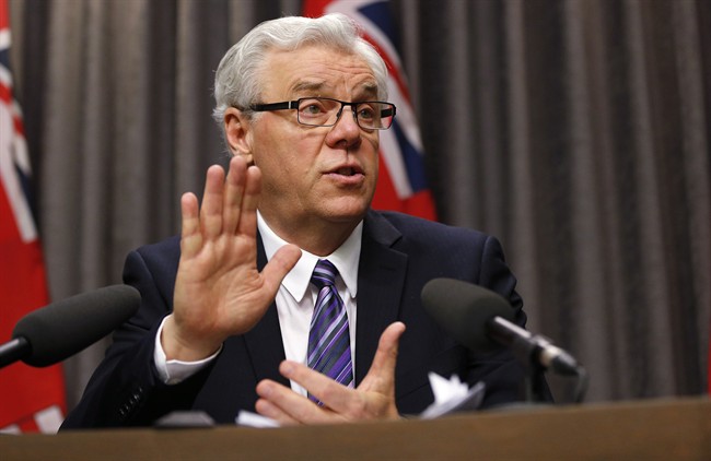 Manitoba Premier Greg Selinger responds to questions regarding the Speech from the Throne at a press conference at the Manitoba Legislature.
