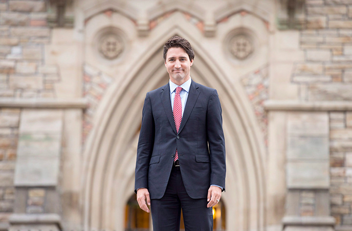 Prime minister-designate Justin Trudeau walks to a news conference from Parliament Hill in Ottawa on Oct. 20, 2015. 