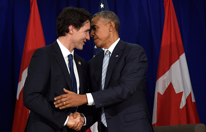 U.S. President Barack Obama and Prime Minister Justin Trudeau stand to shake hands following their bilateral meeting at the Asia-Pacific Economic Cooperation summit in Manila, Philippines, Thursday, Nov. 19, 2015.