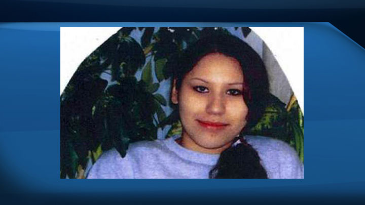 Saskatoon police have positively identified human remains as those of missing woman Karina Beth Ann Wolfe.