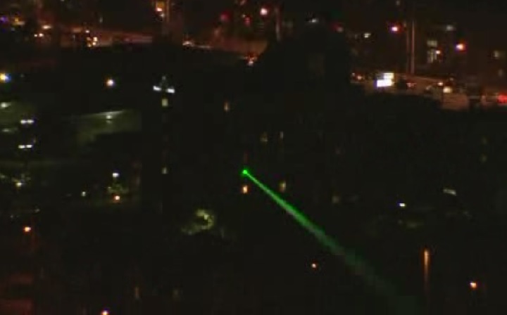 FILE: A laser is directed at a Global News helicopter on Nov. 24, 2015.