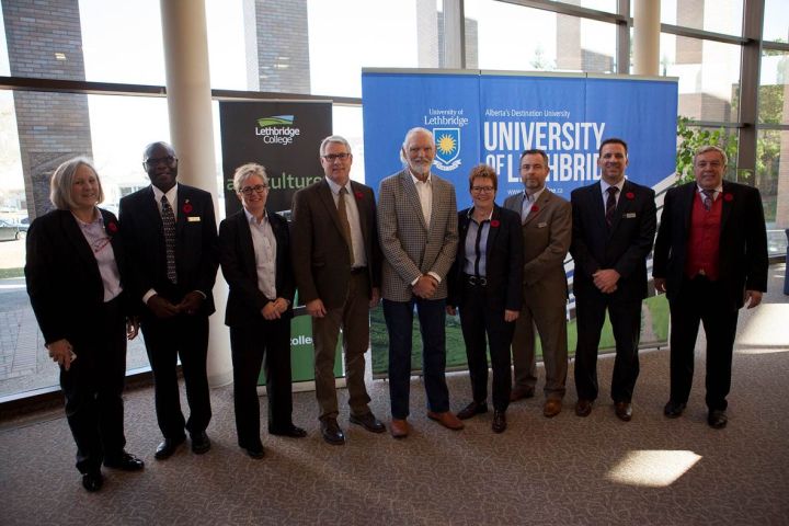Dignitaries celebrate the signing of an agreement between Lethbridge College and the University of Lethbridge.