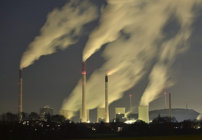 Smoke streams from the chimneys of a coal-fired power station. 