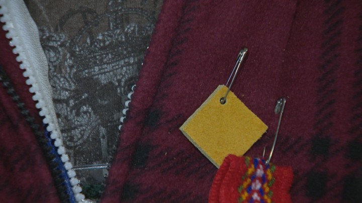 The square patch of moose hide is an emblem for men who oppose violence against indigenous women.