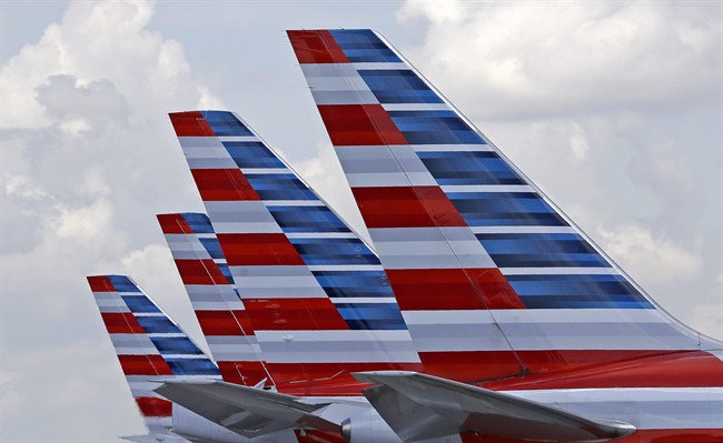 File photo of four American Airlines passenger planes parked at Miami International Airport.