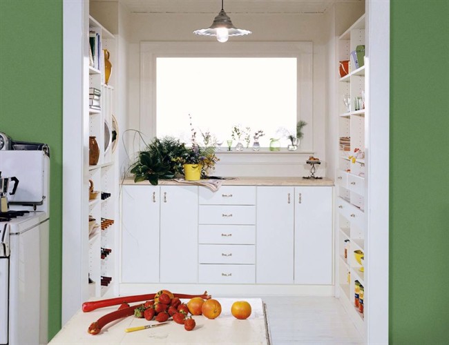 The new "super pantry" like this one designed by California Closets often features shelving, cabinetry and counter space for food prep.
