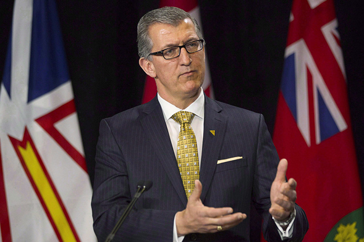 Newfoundland and Labrador Premier Paul Davis takes a question from a reporter on March 3, 2015. 