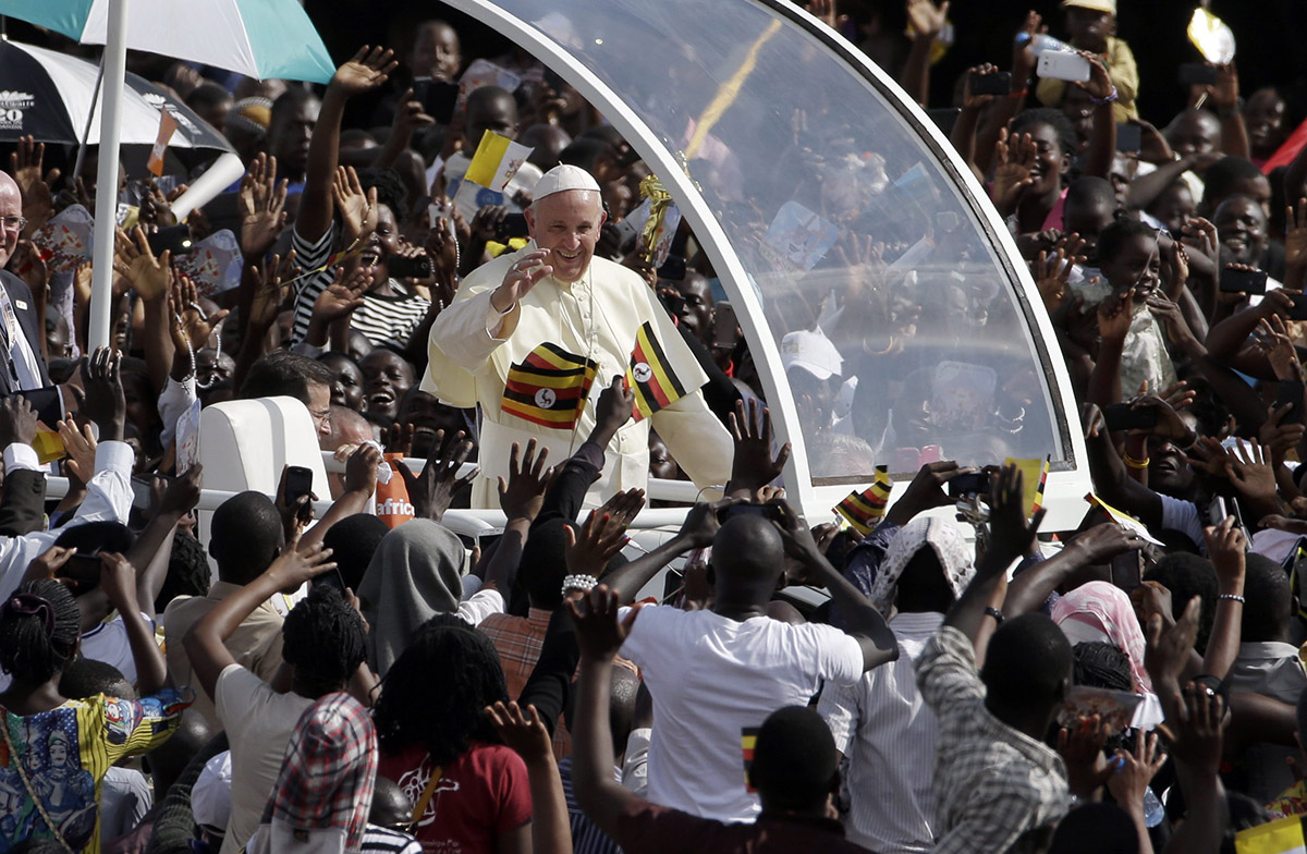 Pope Francis meets with young people at the Kololo airstrip in Kampala, Uganda, Saturday, Nov. 28, 2015. Pope Francis is in Africa for a six-day visit that is taking him to Kenya, Uganda and the Central African Republic.