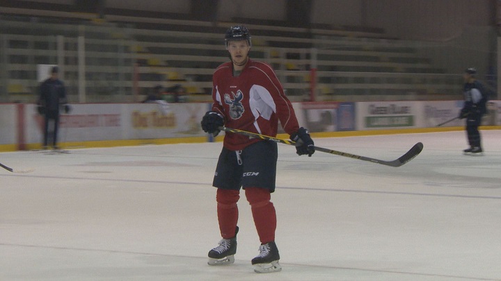 Manitoba Moose forward Matt Fraser skates in his first practice since suffering a concussion on October 29.