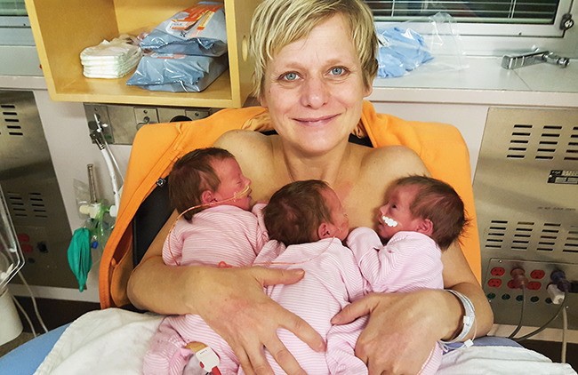Mahalia Meeuwseni holds Hannah, Rileigh and Isabelle, rare identical triplets, in Royal Inland Hospital in Salmon Arm, B.C. The girls were born by C-section on Nov. 3, at about eight weeks premature. THE CANADIAN PRESS/HO-Salmon Arm Observer.