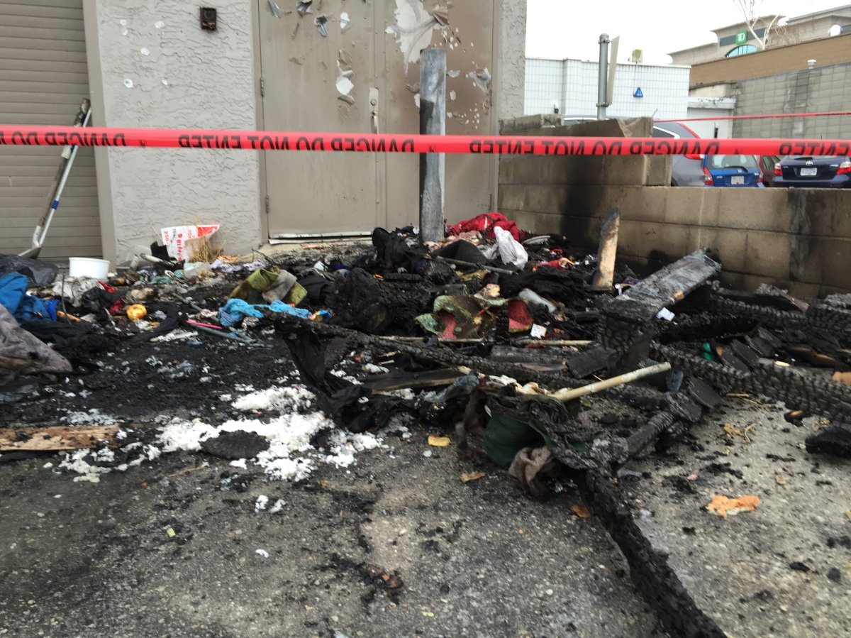 A fire burned through what is believed to be a temporary homeless shelter in downtown Kelowna on Monday morning.