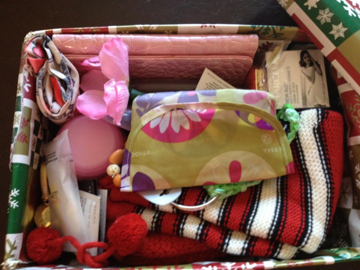 A shoebox filled with gifts for a woman in need.