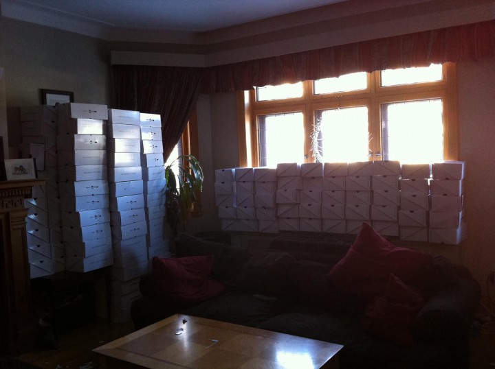 Piles of shoeboxes in Katherine Velan's home.