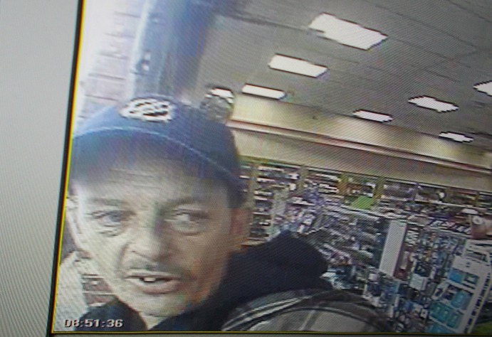 RCMP have released a photo of a man suspected in the theft of poppy donations.