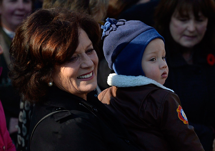 Margaret Trudeau and her grandson Hadrien stand outside Rideau Hall waiting for the swearing-in of her son Prime Minister-designate Justin Trudeau in Ottawa on Wednesday, Nov. 4, 2015.