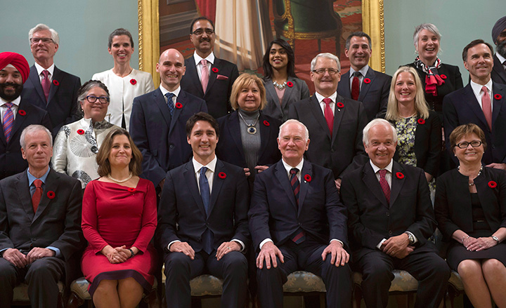 Governor General David Johnston (third from right) and Prime Minister Justin Trudeau pose with members of the gender-equal Liberal cabinet following a swearing-in ceremony, Wednesday Nov.4, 2015 in Ottawa.