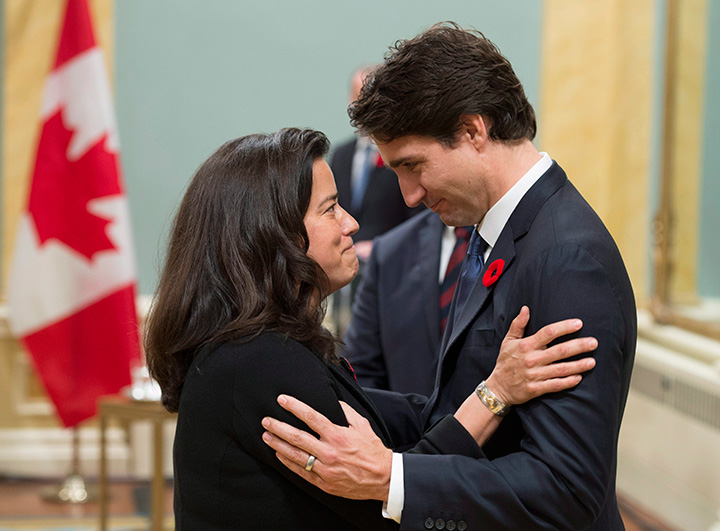 Prime Minister Justin Trudeau speaks with Minister of Justice Jody Wilson-Raybould during a swearing-in ceremony at Rideau Hall, Wednesday Nov.4, 2015 in Ottawa.