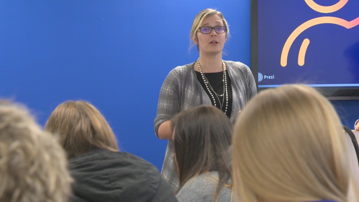 Katherine Topolniski, creative director for Volunteer Alberta, addresses workshop participants.