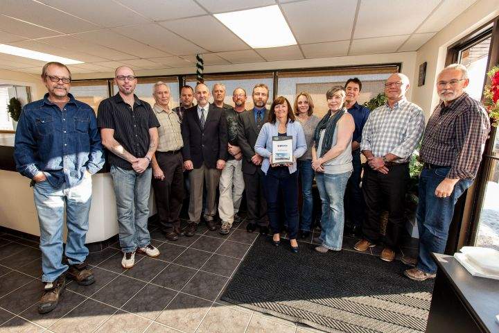 Officials with Westco Construction Ltd. and Lethbridge College celebrate a $50,000 donation.