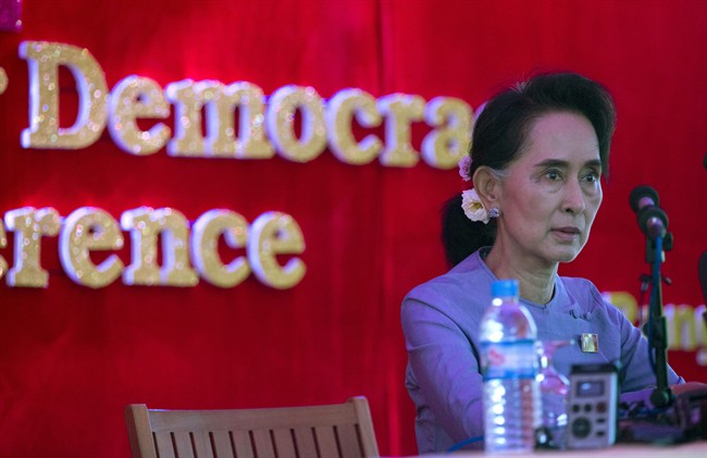 Myanmar's opposition leader Aung San Suu Kyi addresses the media at a press conference at her home in Yangon, Myanmar, Thursday, Nov. 5, 2015.