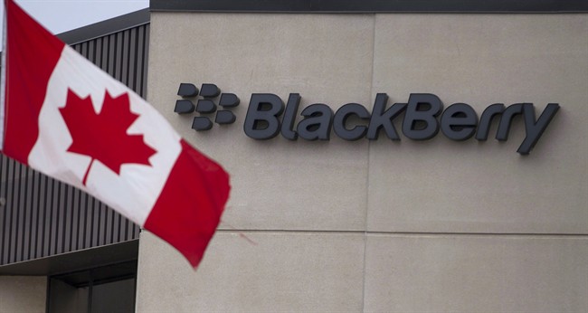 A Canadian flag flies at BlackBerry's headquarters in Waterloo, Ont., Tuesday, July 9, 2013. 