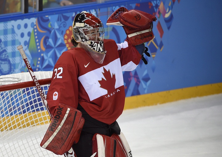 In this file photo, Team Canada goalie Charline Labonte celebrates at the final whistle after women's hockey action against Team USA at the Sochi Winter Olympics on Wednesday, February 12, 2014, in Sochi, Russia. Canada defeated Team USA 3-2. 