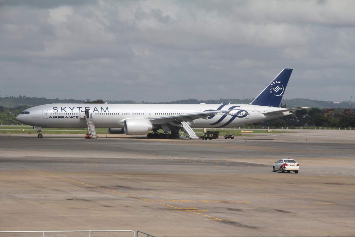 An Air France jet liner which made an emergency landing is seen at Moi International Airport in Mombasa, Kenya Sunday, Dec. 20, 2015. The Boeing 777 Air France flight 463 from Mauritius to Paris was forced to land in the Kenyan coastal city of Mombasa after a device suspected to be a bomb was found in the lavatory, a Kenyan police official said Sunday.
