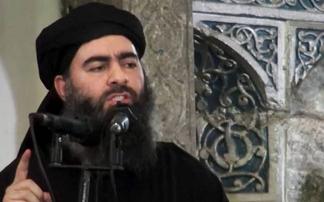 Islamic State group leader Abu Bakr al-Baghdadi delivers a sermon at a mosque in Iraq during his first public appearance.