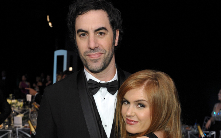 Sacha Baron Cohen, left, and his wife Isla Fisher pose in the audience at the 19th Annual Screen Actors Guild Awards at the Shrine Auditorium in Los Angeles. 