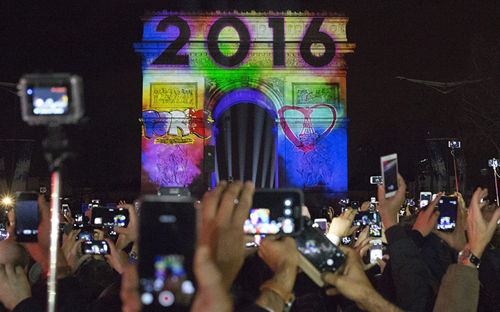 The 2016 appears during the 5-minute video performance displayed on the Arc de Triomphe as part of New Year’s Eve celebrations on the Champs Elysees Avenue in Paris, France, Friday, Jan. 1, 2016.