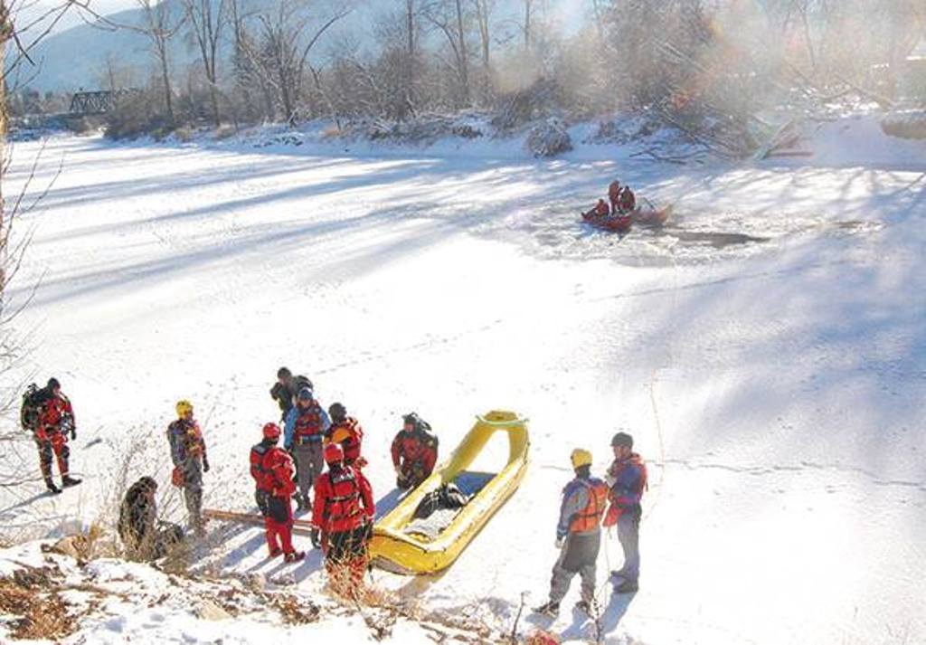 Emergency crews have reported found the body of a man who fell through the ice near Grand Forks.
