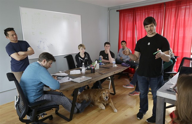 In this Feb. 4, 2015 photo, Josh Tetrick, CEO and founder of Hampton Creek Foods, speaks during a staff meeting at their office in San Francisco.