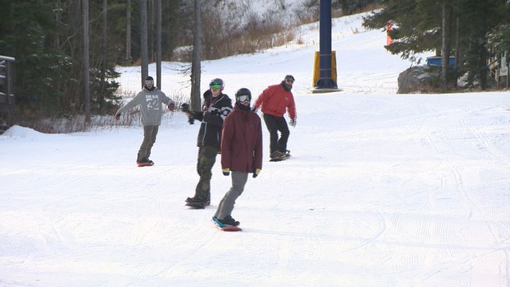 Snowboarders enjoy very good early season conditions at Castle Mountain Resort.