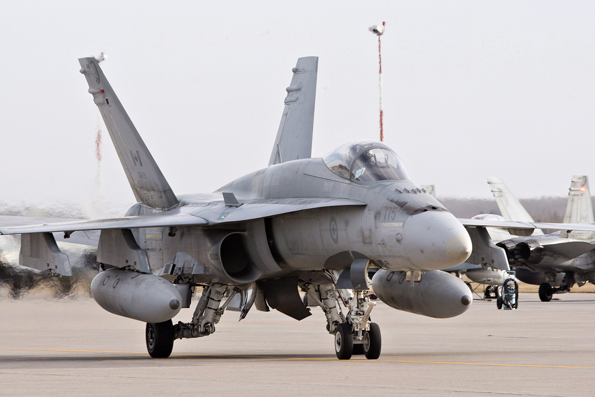 A pilot positions a CF-18 Hornet at the CFB Cold Lake, in Cold Lake, Alberta on Tuesday October 21, 2014. 