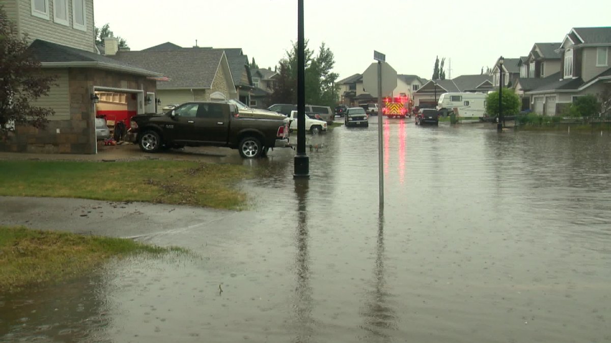 Flooded street in Chestermere, Alberta - July 2015.