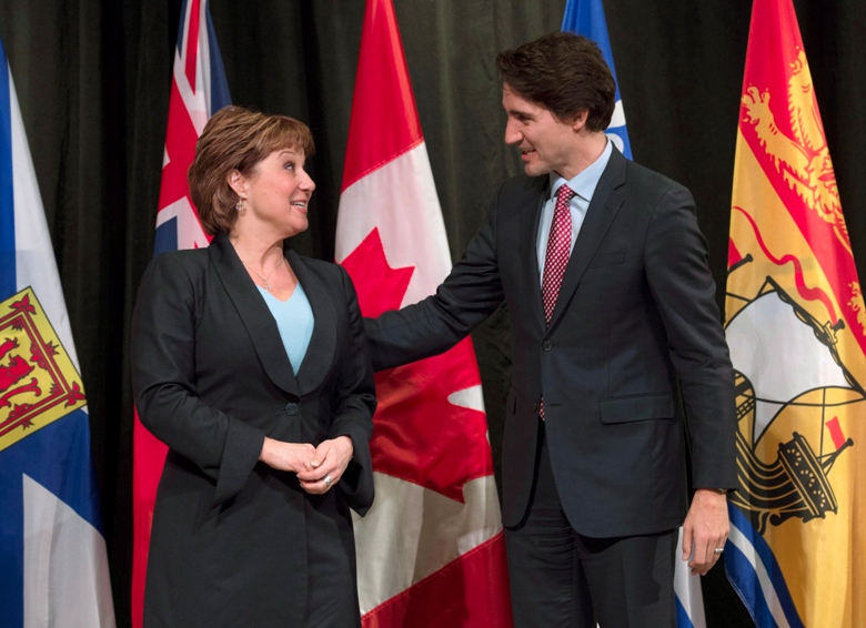 Prime Minister Justin Trudeau speaks with B.C. Premier Christy Clark in a file photo.