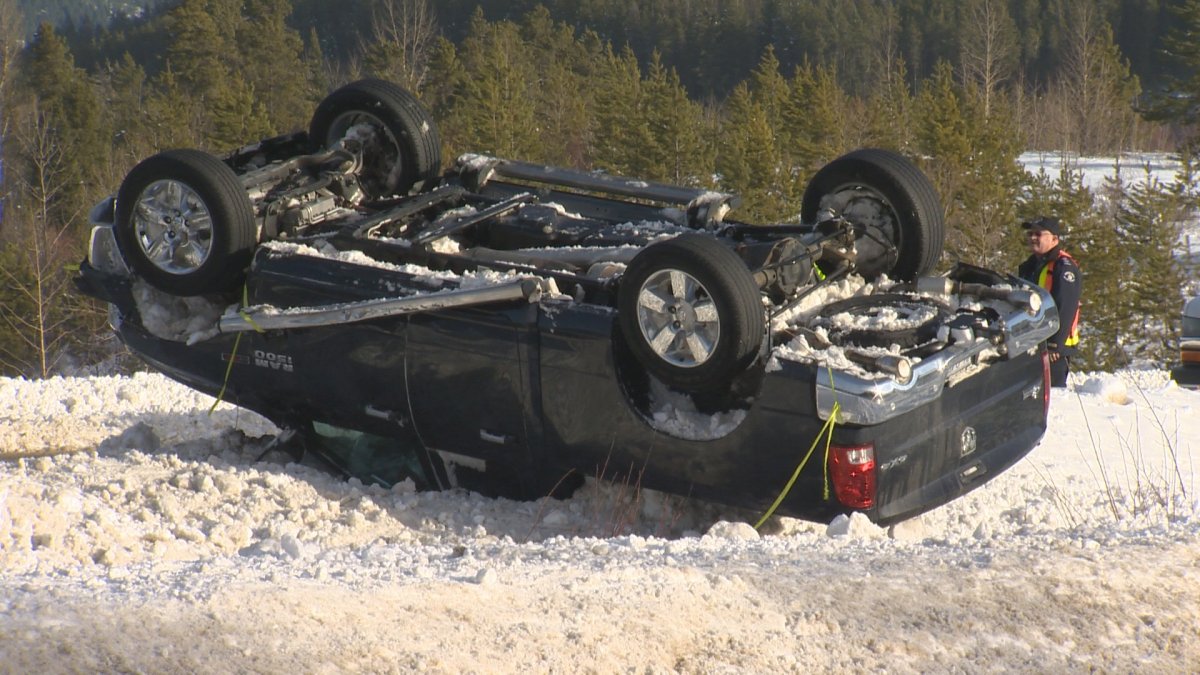 Rollover on the Connector; windy and slippery conditions - image