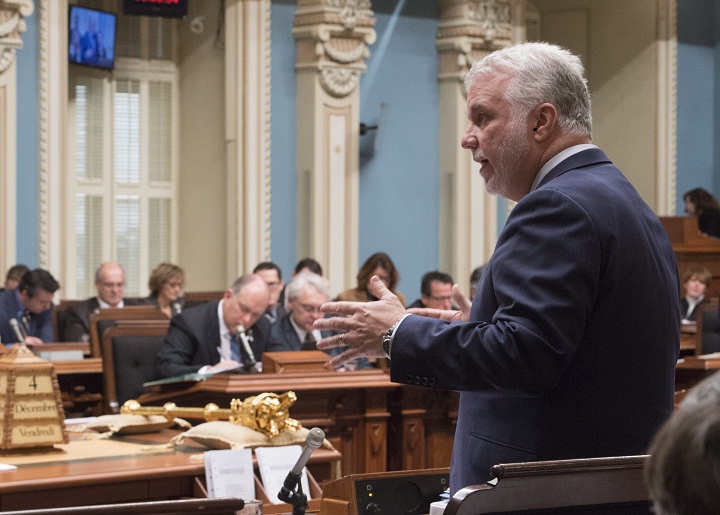 Quebec Premier Philippe Couillard responds to the Opposition during question period Friday, December 4, 2015 at the legislature in Quebec City. 