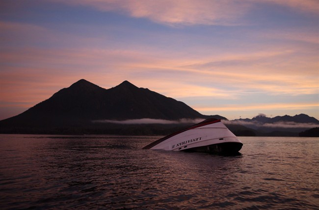 The bow of the Leviathan II, a whale-watching boat owned by Jamie's Whaling Station that capsized in October, is seen near Vargas Island looking towards Cat Face Island as it waits to be towed into town for inspection in Tofino, B.C., Tuesday, October 27, 2015. Six people died in the tragedy.