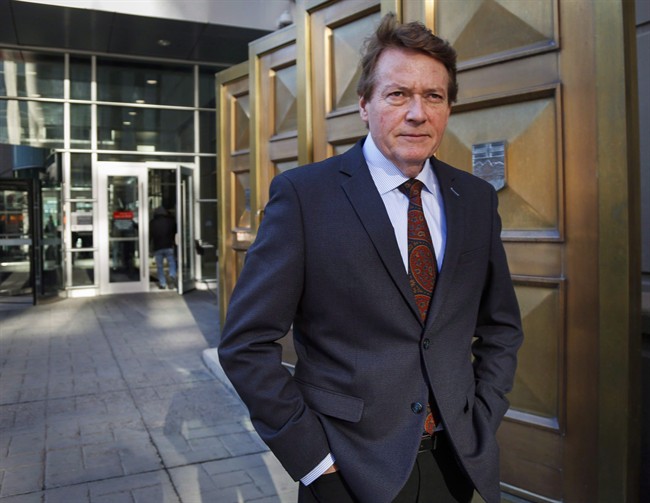 Former TV journalist Arthur Kent is seen outside court during a break in his lawsuit against Postmedia and other individuals related to a 2008 column, in Calgary, Alta., on November 16, 2015. 