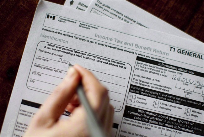 A T1 General 2010 tax form is pictured in Toronto on April 13, 2011. The tax rules are changing in 2016 and even if Canadians don't make enough to be hit by the new top federal income tax rate, their financial plans are going to need to be reviewed.