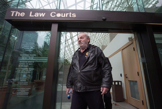 Ivan Henry,leaves B.C. Supreme Court during a lunch break in Vancouver, B.C., on Monday August 31, 2015. The lawyer of a man wrongfully imprisoned for 27 years says her client's 1983 sexual-assault trial is Canada's most egregious example of the Crown withholding evidence.