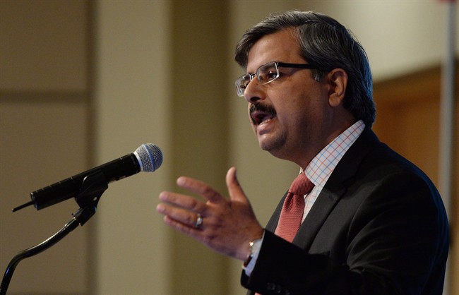 Canada Post President and CEO Deepak Chopra speaks during Canada Post's annual public meeting in Ottawa on Thursday, May 21, 2015. A Liberal government appeal for former Conservative appointees to voluntarily step down has been marked "return to sender" by Canada Post.