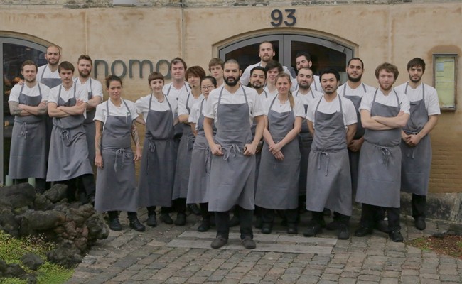 Ben Ing, of Ottawa, says it's an "honour" to be vaulted to the new head chef position at Rene Redzepi's establishment, Noma. Ing, centre, stands amongst chefs in front of the Michelin two-star rated restaurant in a Dec. 20, 2015 photo.