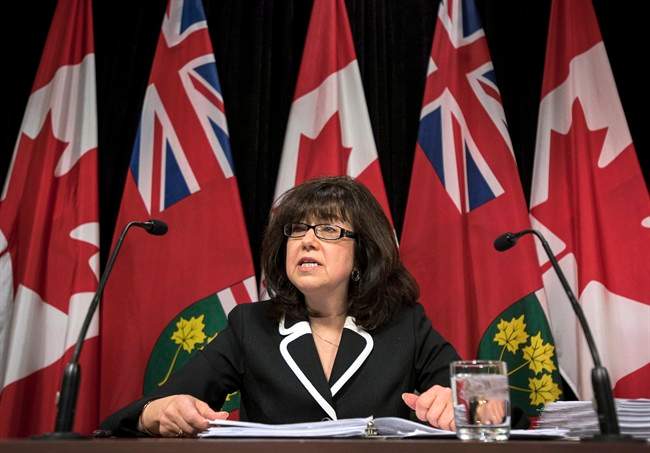 Bonnie Lysyk, Ontario's auditor general, says the provincial government is spending an extra $52 million to fixed a system known to be flawed before it ever launched.