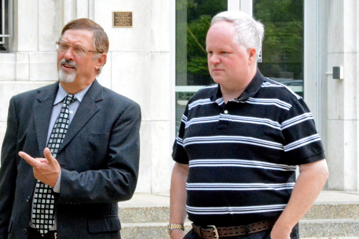 William Melchert-Dinkel, right, and his attorney Terry Watkins leave court in Faribault, Minnesota in August 2014.  